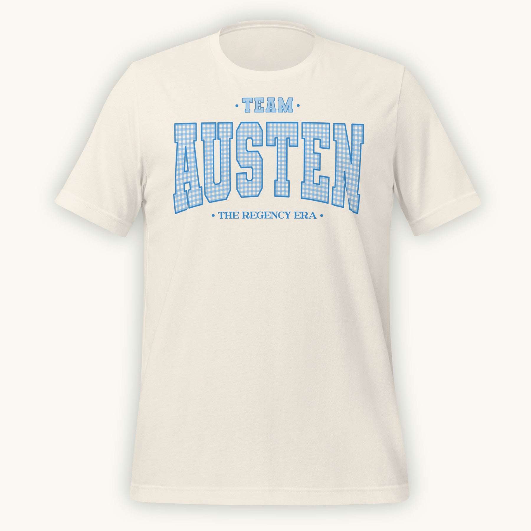 Vintage white t-shirt with 'Team Austen The Regency Era' in blue gingham style varsity text on a white background