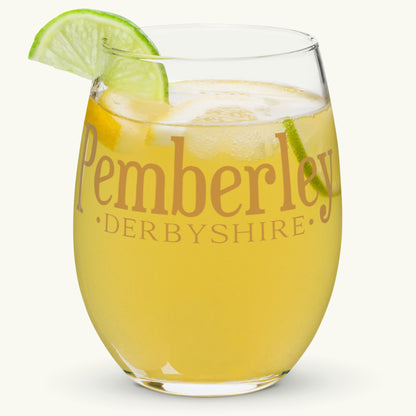 Pemberley Stemless Wine Glass filled with juice. Jane Austen Pride and Prejudice